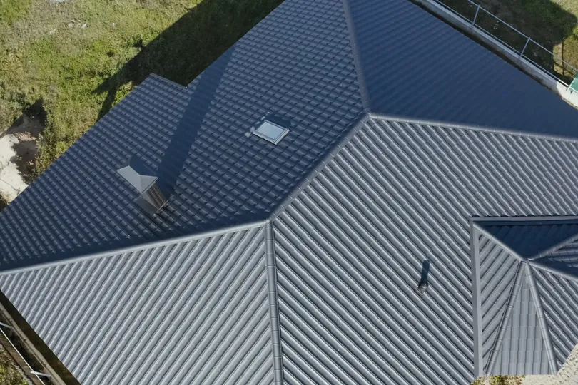metal roof shingles on a modern house
